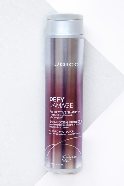 Defy Damage Protective Shampoo by Joico for Unisex - 10.1 oz Shampoo